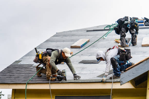 Professional Gutter Installation technician working in Valley Village, CA